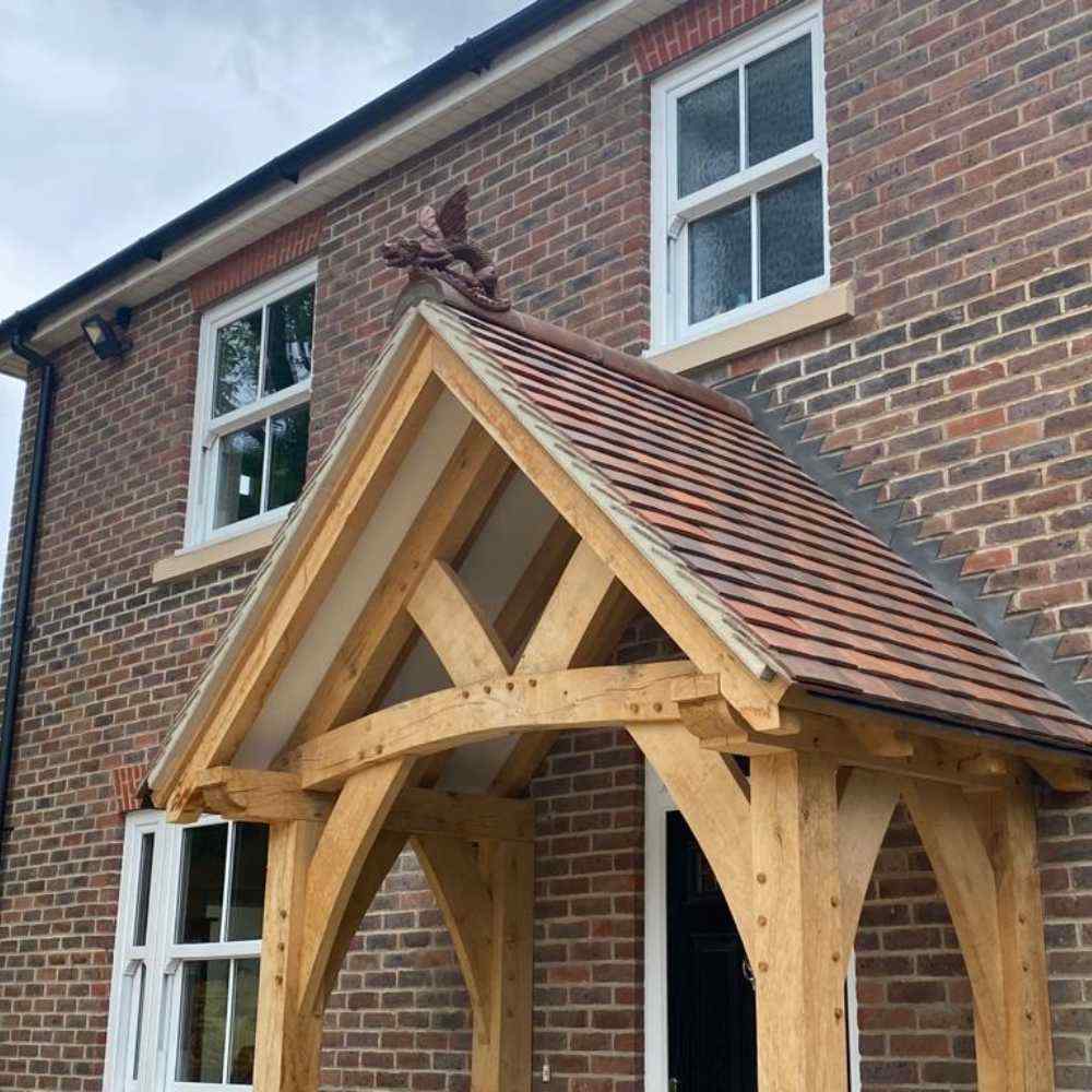 Dragon finial on a timber frame porch roof