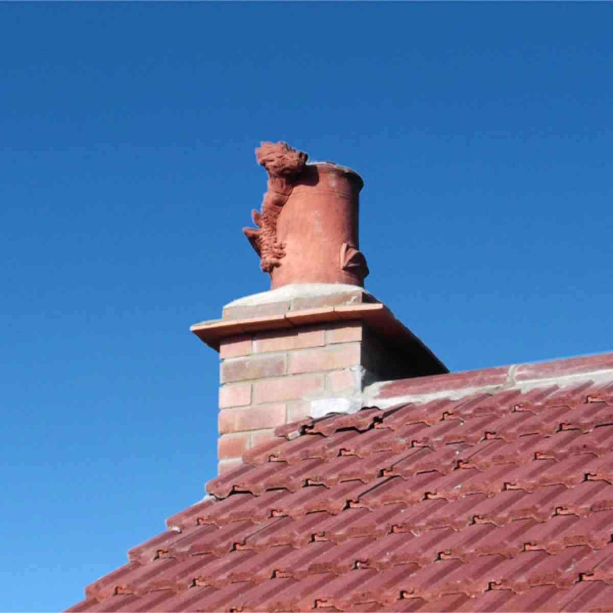 dragon chimney pot on roof